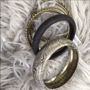 Brand new gold and black bracelet